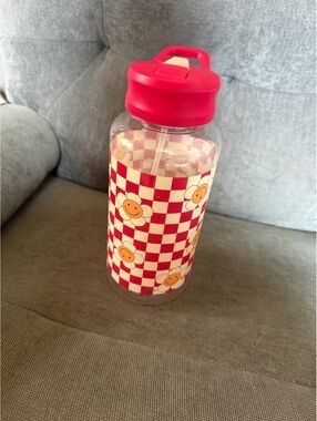 Plastic Water Bottle with Red Checkered and Smiley Flower Design